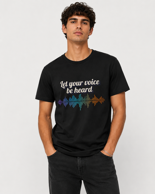 Model wearing a black tee with a Let Your Voice Be Heard soundwave design