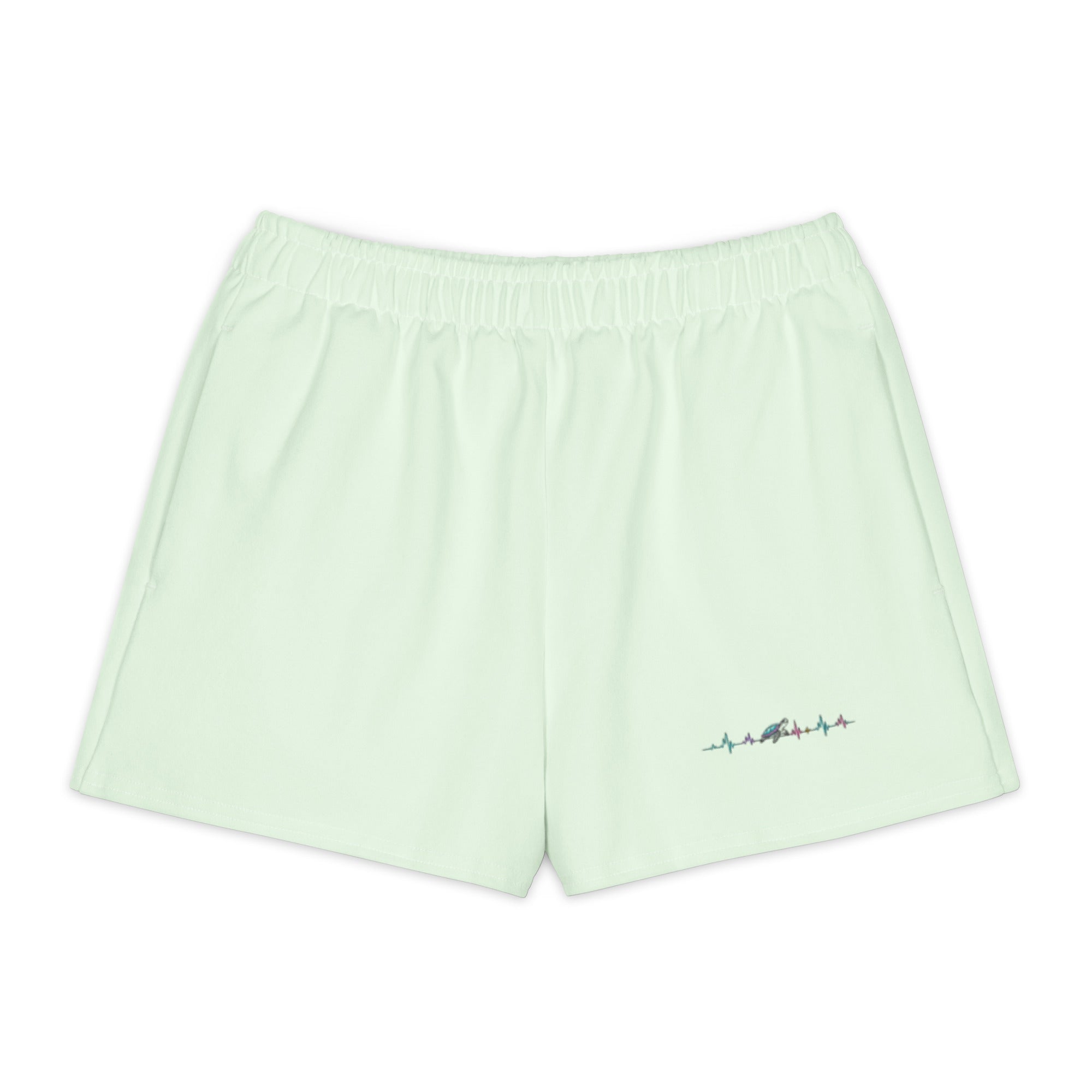 Product mockup of green short with turtle riding audiowave