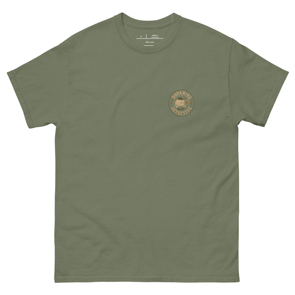 Product mockup of military green shirt with small brain that says dopamine detective for adhd awareness and advocacy